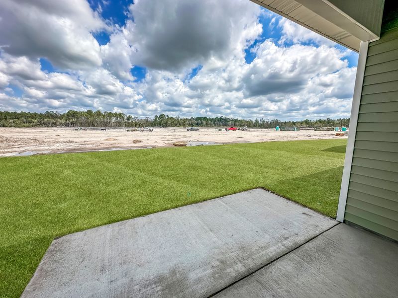 Exterior details and patio area of a home in Grand Reserve, Hinesville (Image 2).