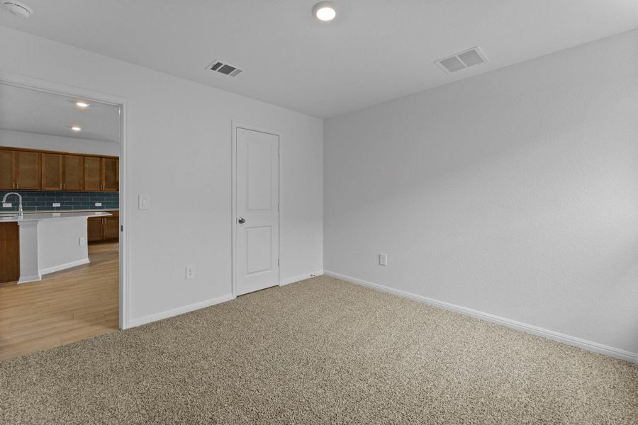 Spacious, unfurnished interior of a new home in Bar W Ranch, Leander (Image 20).