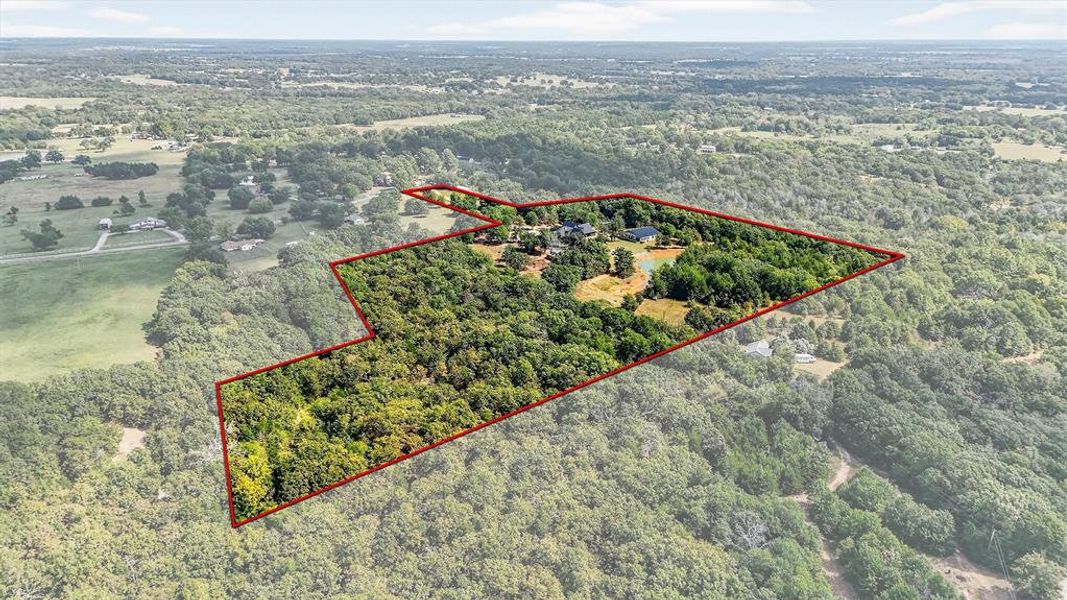 Aerial view of property's location featuring property boundaries highlighted Aerial view of property's location featuring property boundaries highlighted