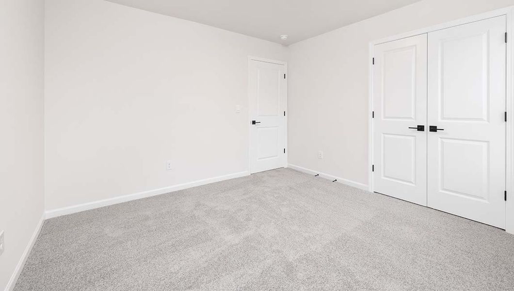 Spacious, unfurnished interior of a new home in Falls Cove, Troutman (Image 25).