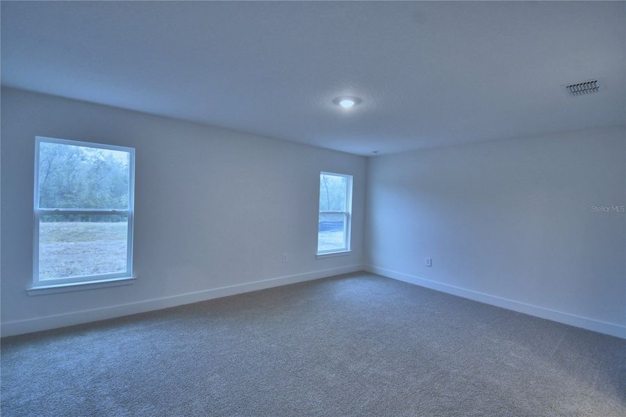 Spacious, unfurnished interior of a new home in Cadence Crossing, Auburndale (Image 32).