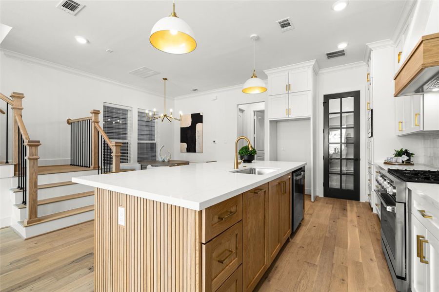 Central island with wood accents throughout.