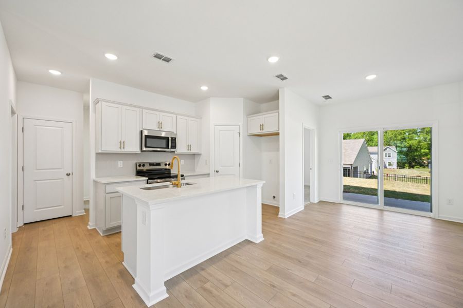 Representative furnished interior of a home built from the Grove by Ashton Woods in Middleton Farms, Middlesex (Image 4).