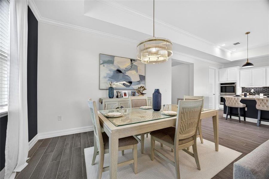 Furnished interior view inside a new home in Heritage Station, Punta Gorda (Image 19).