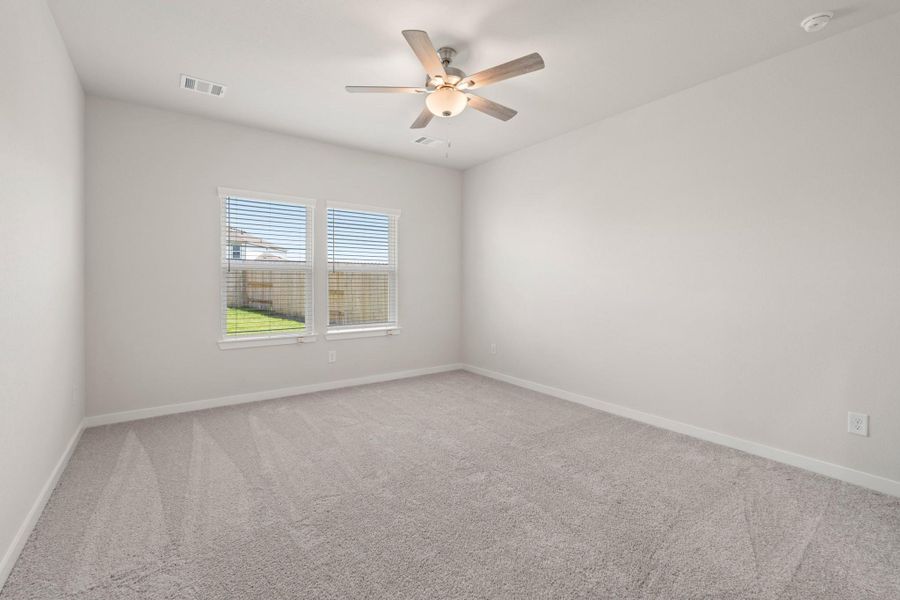 Spacious, unfurnished interior of a new home in Sunterra, Katy (Image 12).