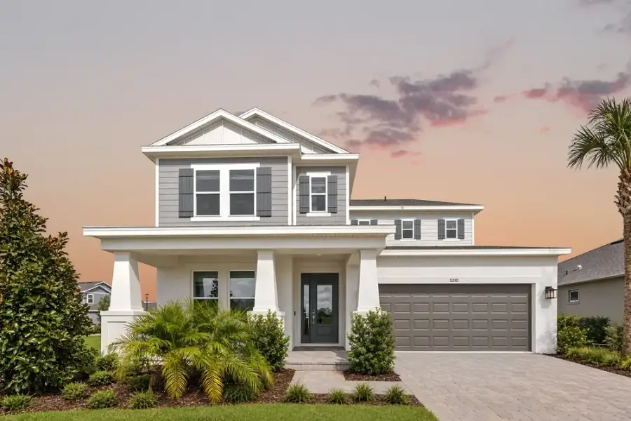 Front exterior of a new home in Center Lake Ranch Community Group Page, St. Cloud, FL, highlighting curb appeal (Image 25).