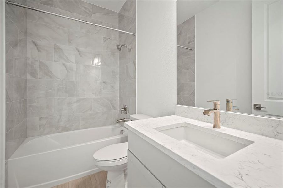 Furnished interior view inside a new home in Fieldstone, Plant City (Image 8).