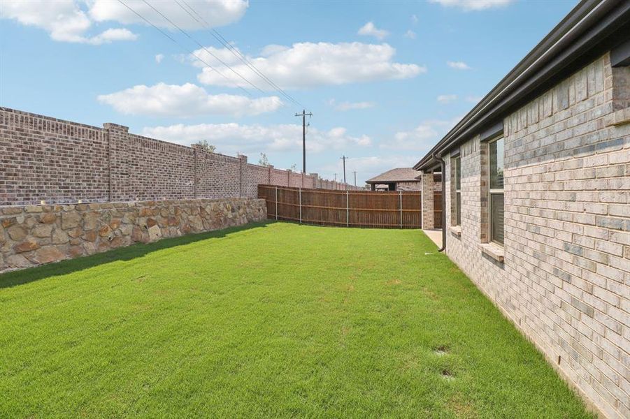 Exterior details and patio area of a home in Southridge - Signature Series, McKinney (Image 4). Exterior details and patio area of a home in Southridge - Signature Series, McKinney (Image 4).