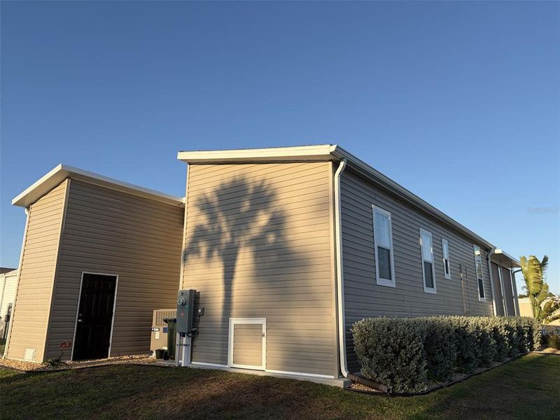 Exterior details and patio area of a home in , North Port (Image 24).