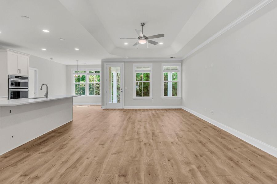 Spacious, unfurnished interior of a new home in Tidewater at Lakes of Cane Bay, Summerville (Image 12).