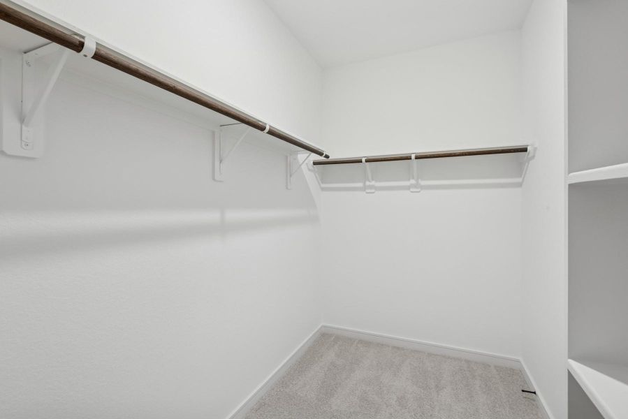Large walk-in closet Large walk-in closet