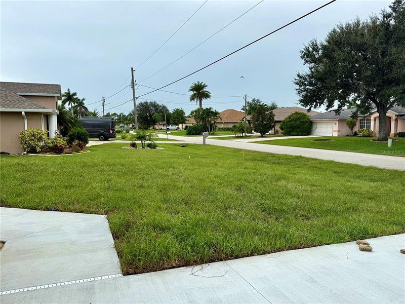 Front exterior of a new home in Rotonda, Rotonda West, FL, highlighting curb appeal (Image 2). Front exterior of a new home in Rotonda, Rotonda West, FL, highlighting curb appeal (Image 2).