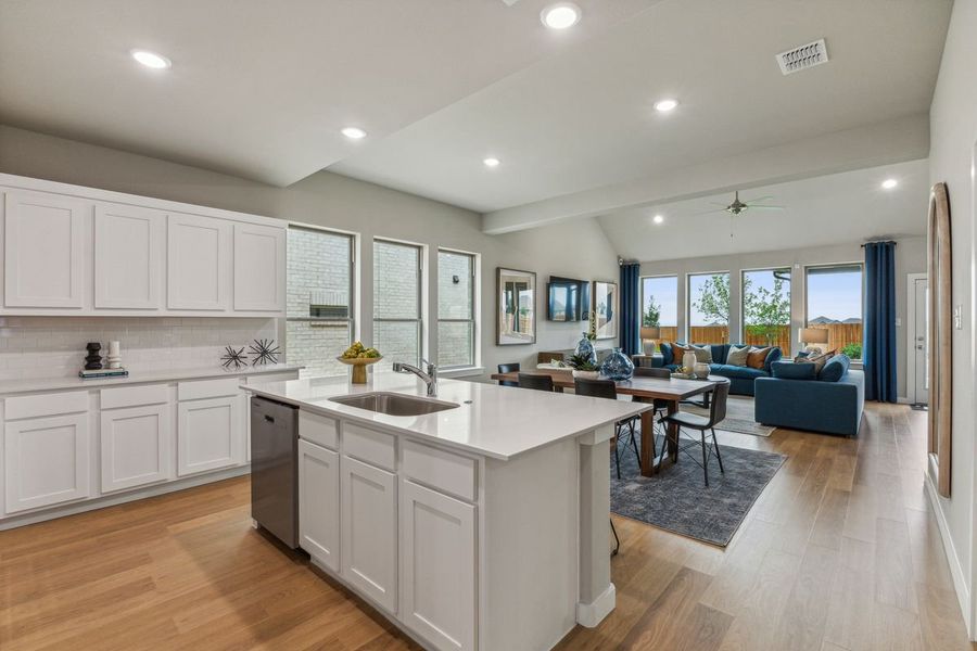 Kitchen in the Stanley II home plan by Trophy Signature Homes – REPRESENTATIVE PHOTO