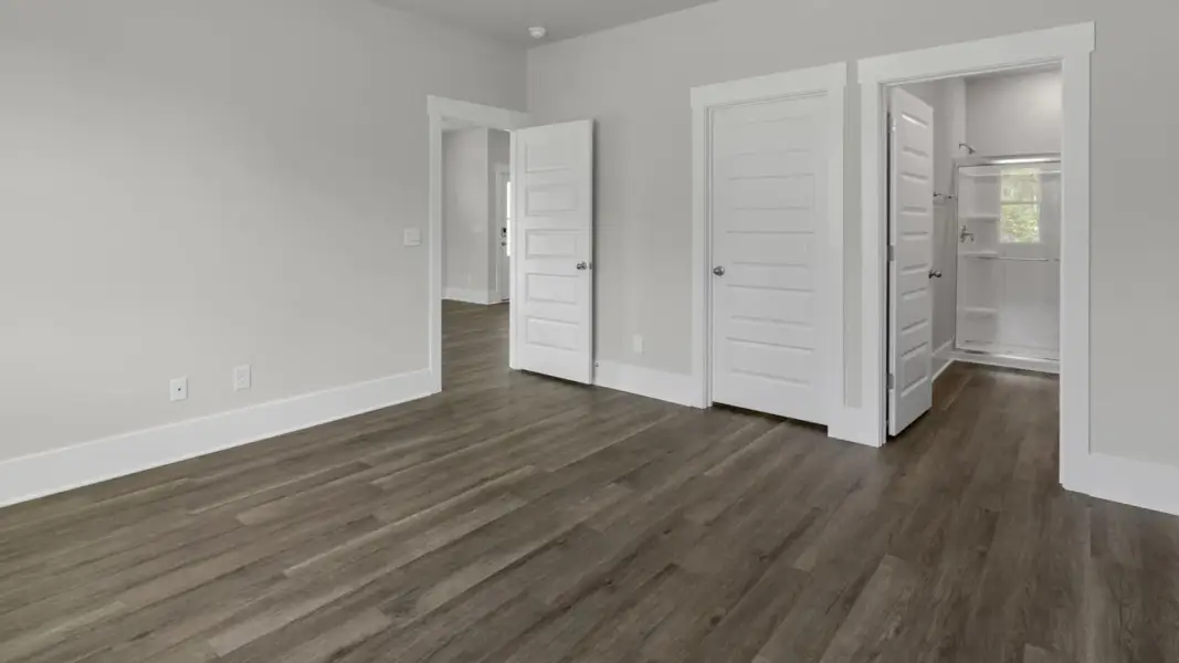 Spacious, unfurnished interior of a new home in The Retreat at Indigo Preserve Townhomes, Leland (Image 19).