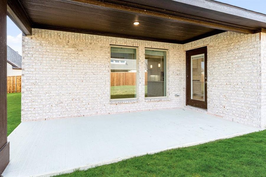 Exterior details and patio area of a home in ArrowBrooke, Aubrey (Image 3). Exterior details and patio area of a home in ArrowBrooke, Aubrey (Image 3).