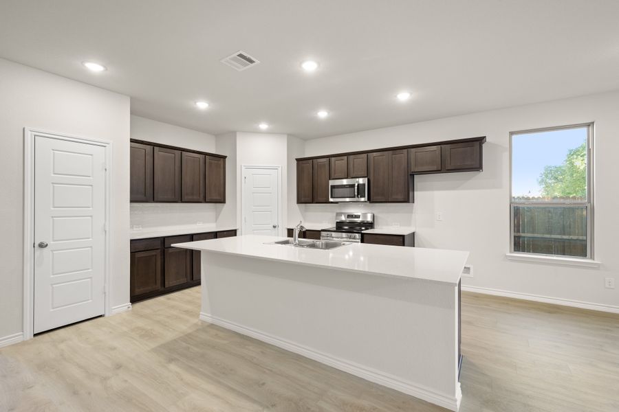 Furnished interior view inside a new home in Eagle Cove, Denton (Image 9).