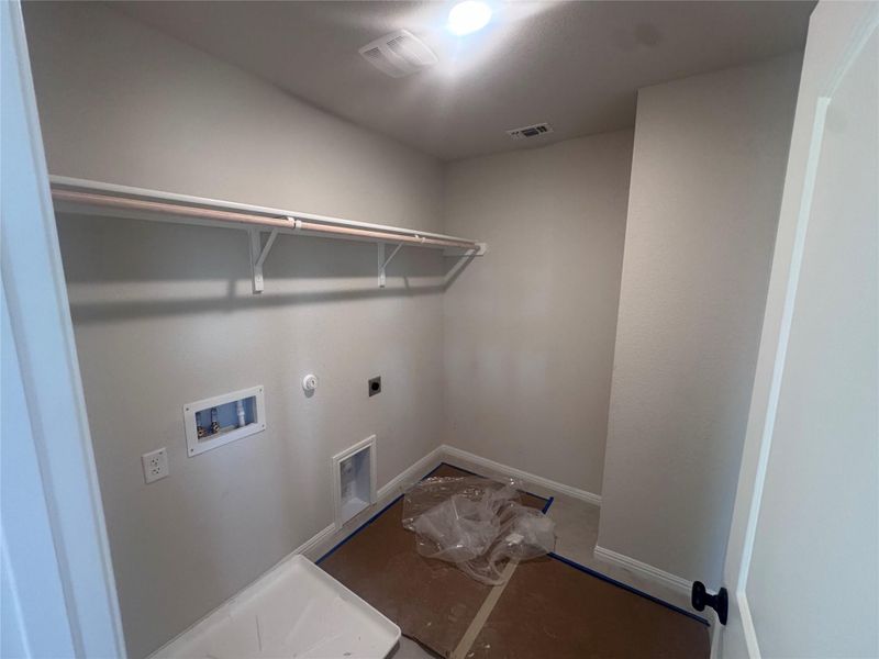 In-progress construction of a new home in Rolling Glen, Hutto, TX (Image 25).