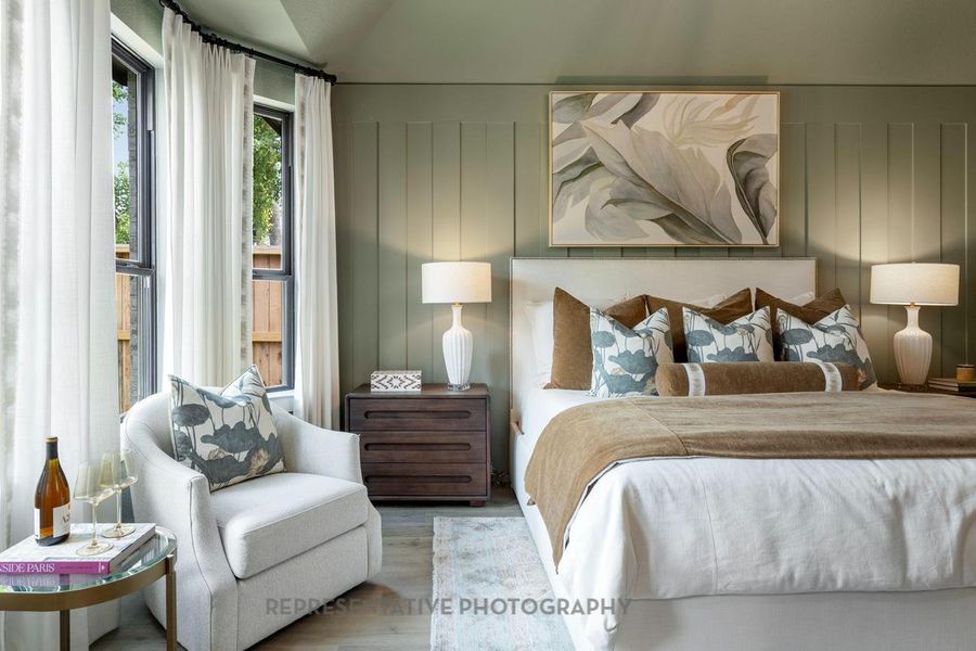 Bedroom featuring wood finished floors Bedroom featuring wood finished floors