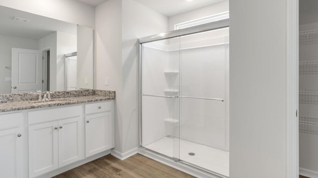 Representative furnished interior of a home built from the HARBOR OAK by D.R. Horton in Indigo Preserve, Leland (Image 13).