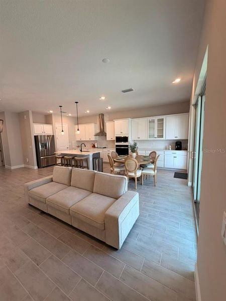 Furnished interior view inside a new home in , Winter Garden (Image 5).