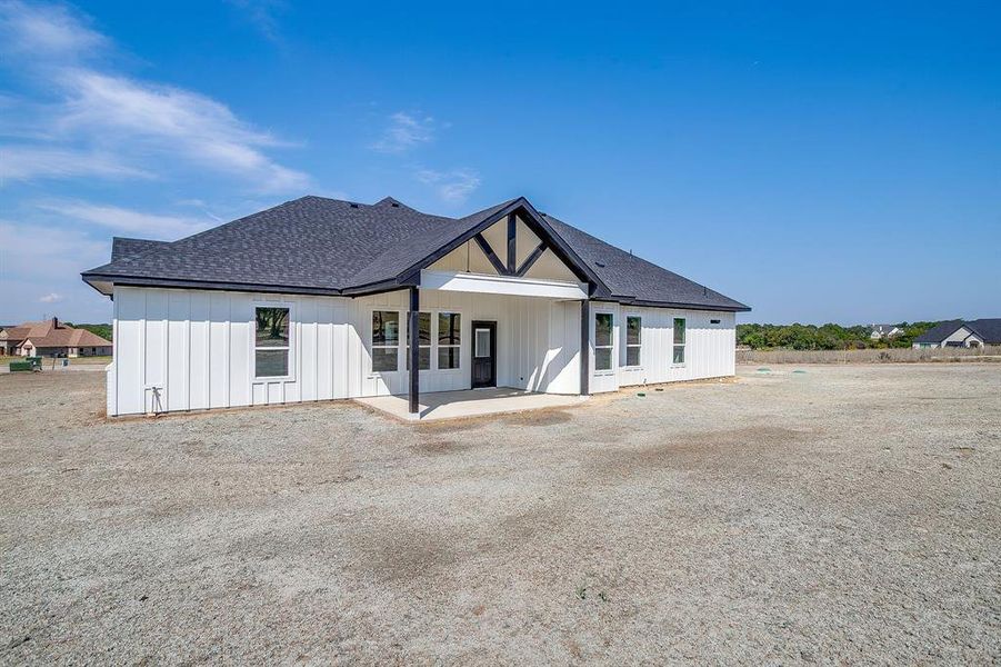Front exterior of a new home in , Weatherford, TX, highlighting curb appeal (Image 2).