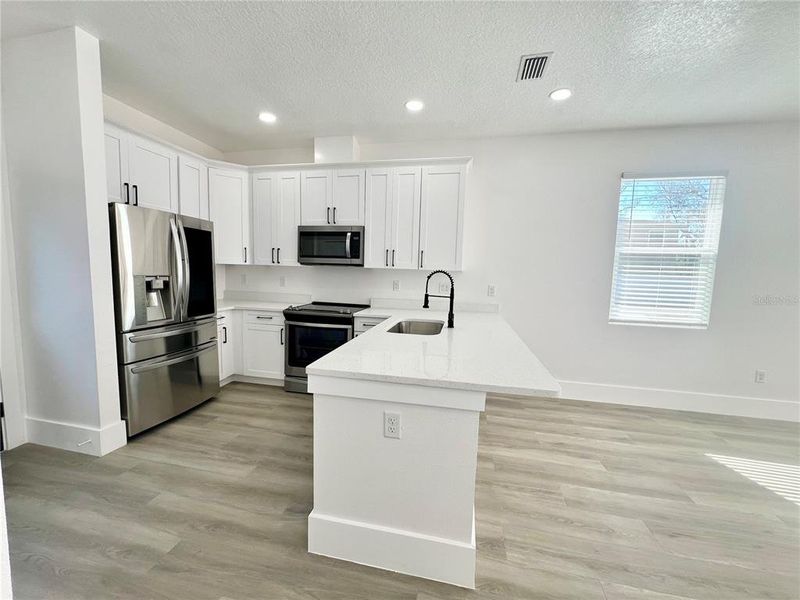 Furnished interior view inside a new home in , Tampa (Image 8).