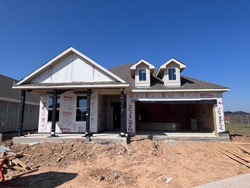 In-progress construction of a new home in Sunterra, Katy, TX (Image 27).