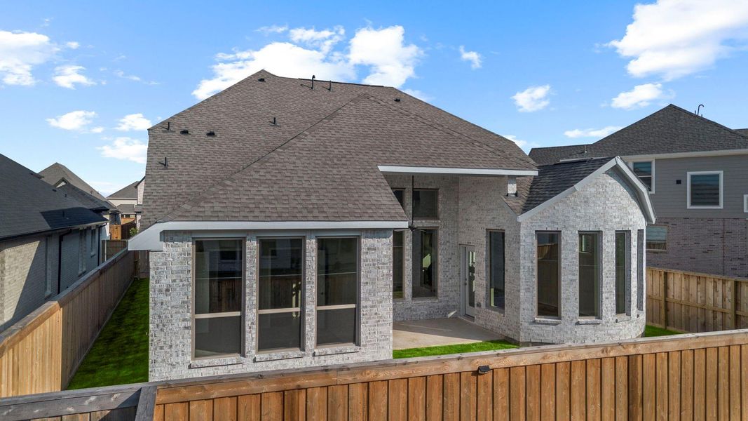 Exterior details and patio area of a home in Dunham Pointe 50', Cypress (Image 20).
