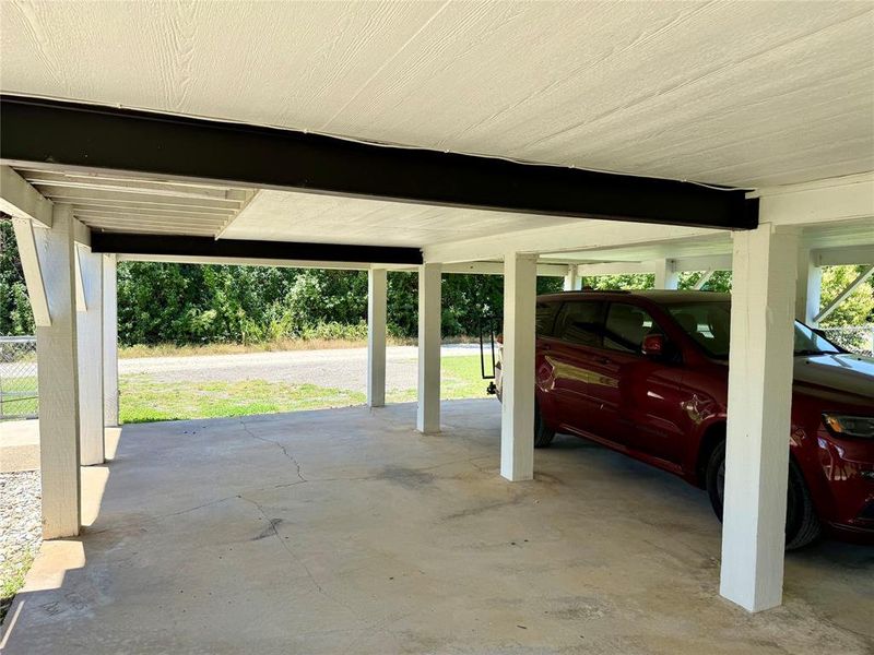 2 spaces and room for the golf cart.