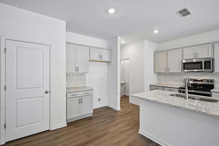 Kitchen featuring Milan Collection Finishes