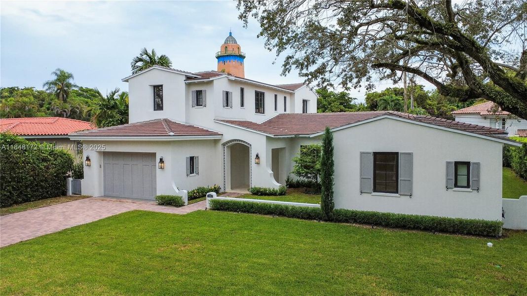 Front exterior of a new home in , Coral Gables, FL, highlighting curb appeal (Image 23).
