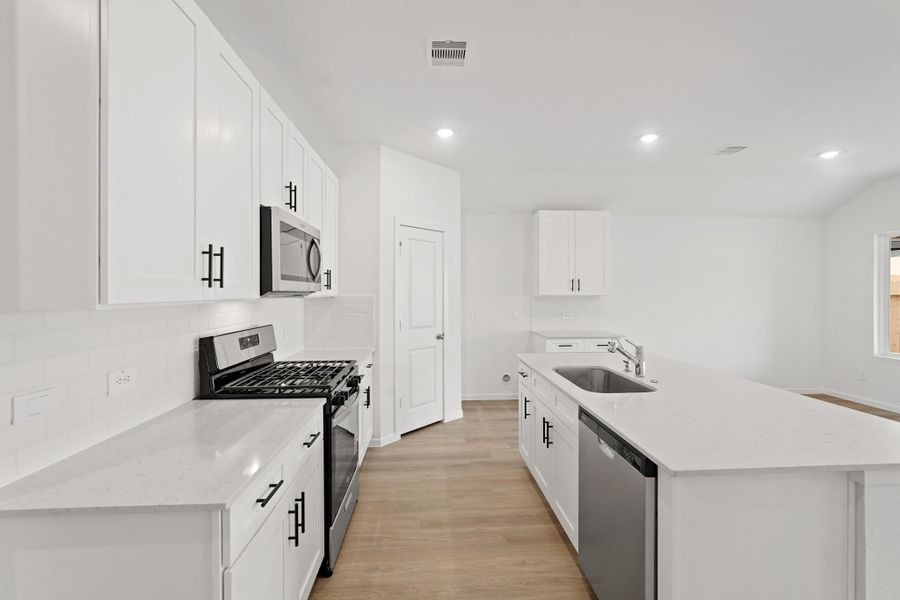 Furnished interior view inside a new home in Grand Pines, Magnolia (Image 5).