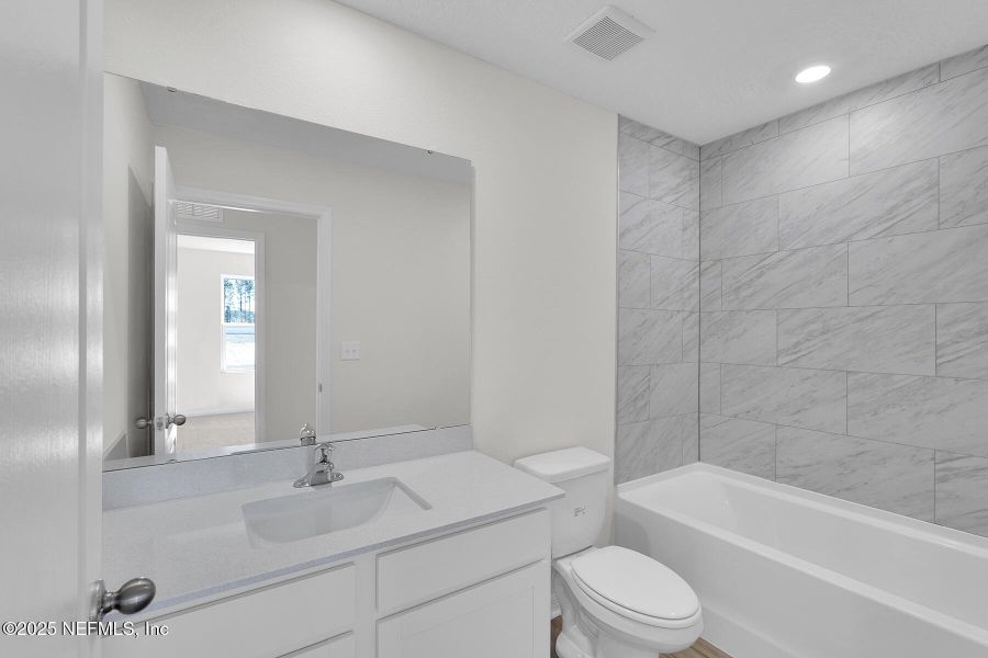 Furnished interior view inside a new home in , Jacksonville (Image 3). Furnished interior view inside a new home in , Jacksonville (Image 3).