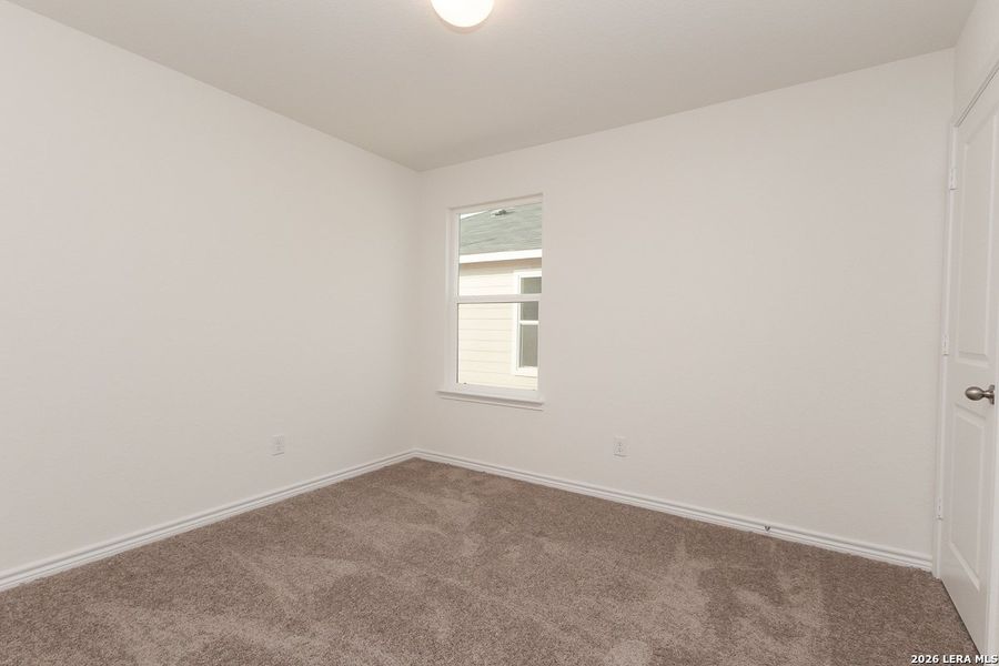 Spacious, unfurnished interior of a new home in Preserve at Culebra - Classic Collection, San Antonio (Image 19).