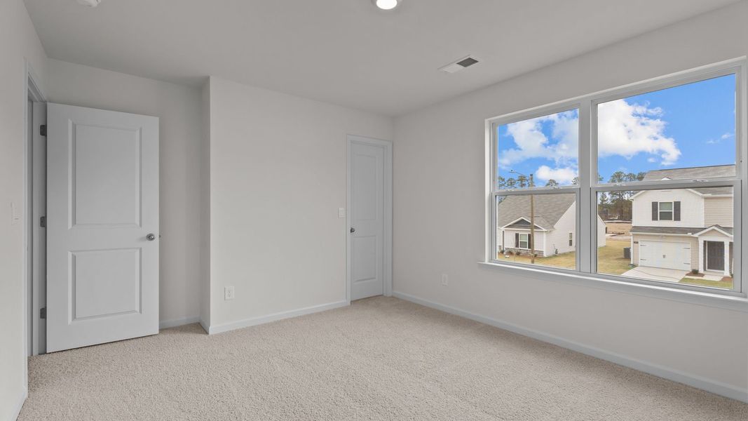 Representative unfurnished interior of a home built from the Rachel by D.R. Horton in Hobbs Farm, Ayden (Image 26).