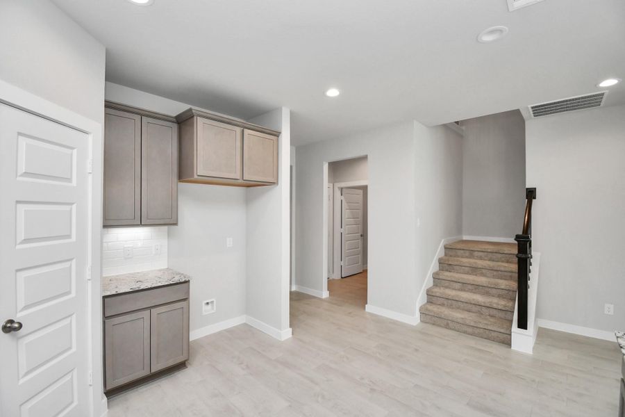This generously spacious kitchen is a dream realized! Sample photo of completed home with similar floor plan. Actual colors and selections may vary.