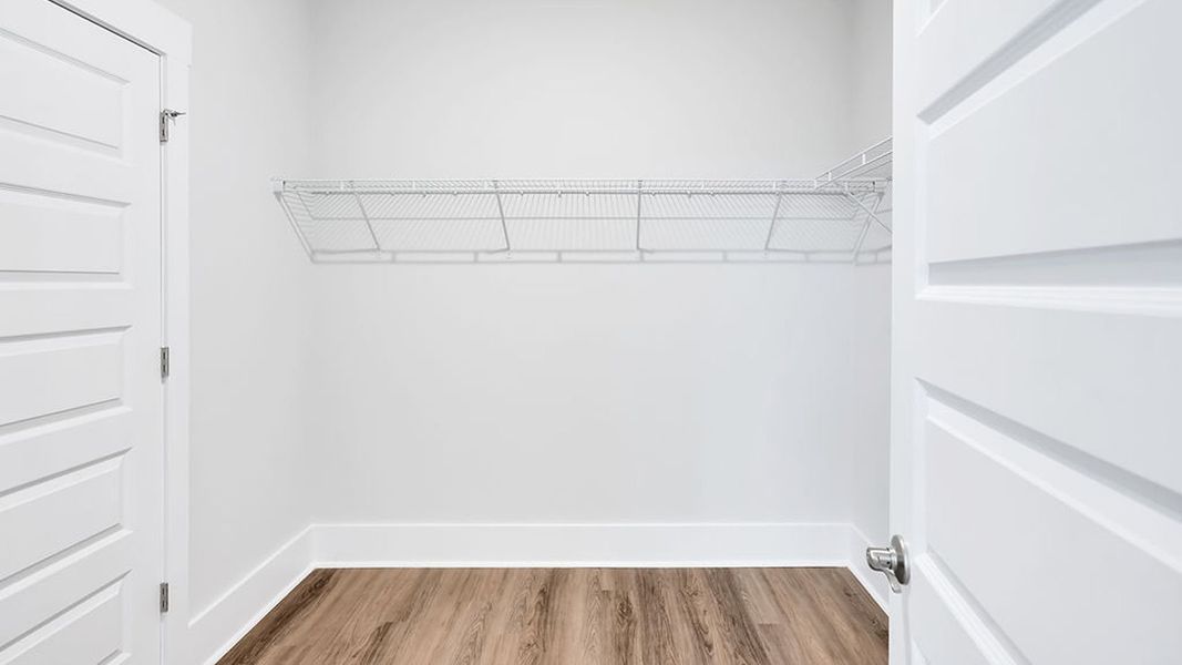 Spacious, unfurnished interior of a new home in The Haven at Indigo Preserve, Leland (Image 26).