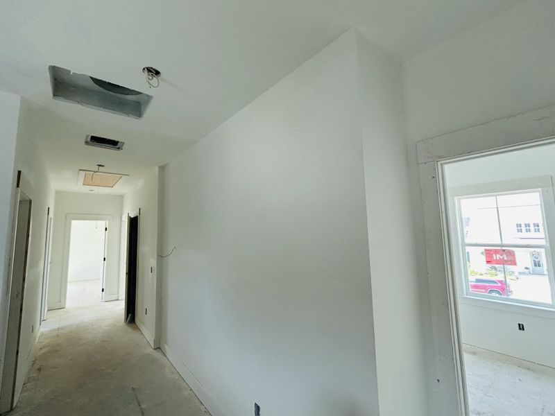 Spacious, unfurnished interior of a new home in The Domus Collection at Midtown Nexton, Summerville (Image 48).