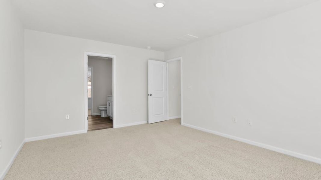 Spacious, unfurnished interior of a new home in Village Grove, Greenville (Image 31).