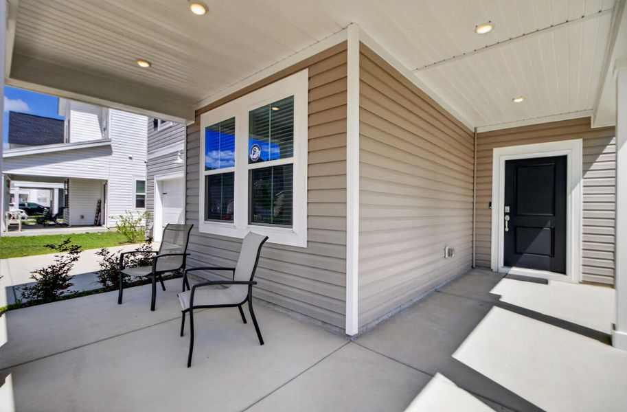 Exterior details and patio area of a home in Limehouse Village: Arbor Series, Summerville (Image 3). Exterior details and patio area of a home in Limehouse Village: Arbor Series, Summerville (Image 3).