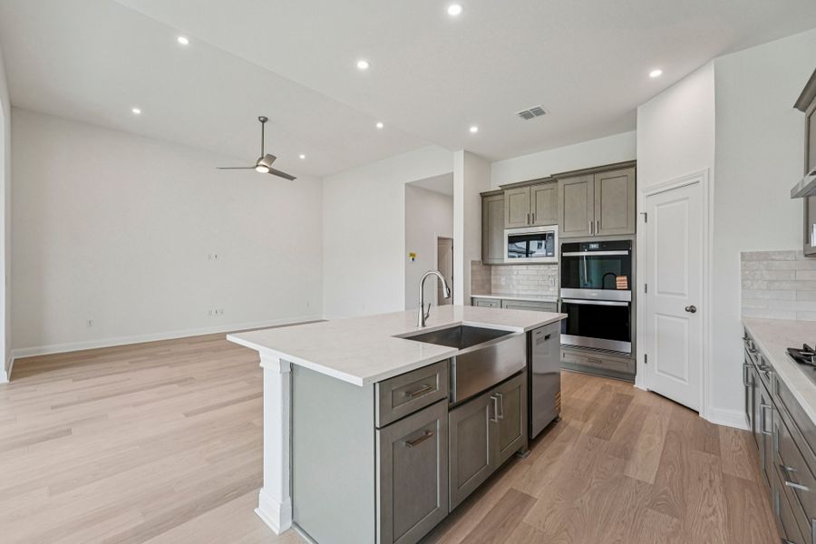 Furnished interior view inside a new home in Sage Hollow, Kyle (Image 4).