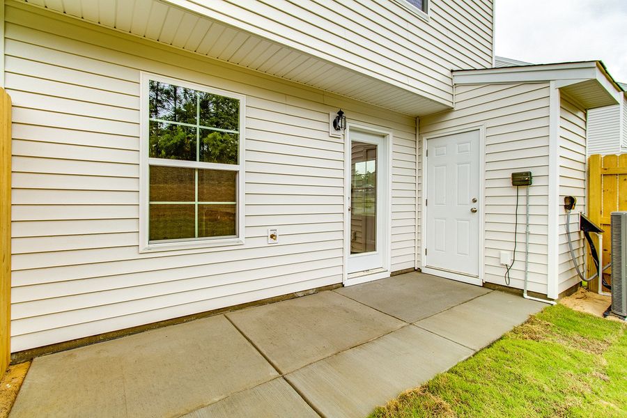 Exterior details and patio area of a home in Padgett Commons, Hopkins (Image 3).