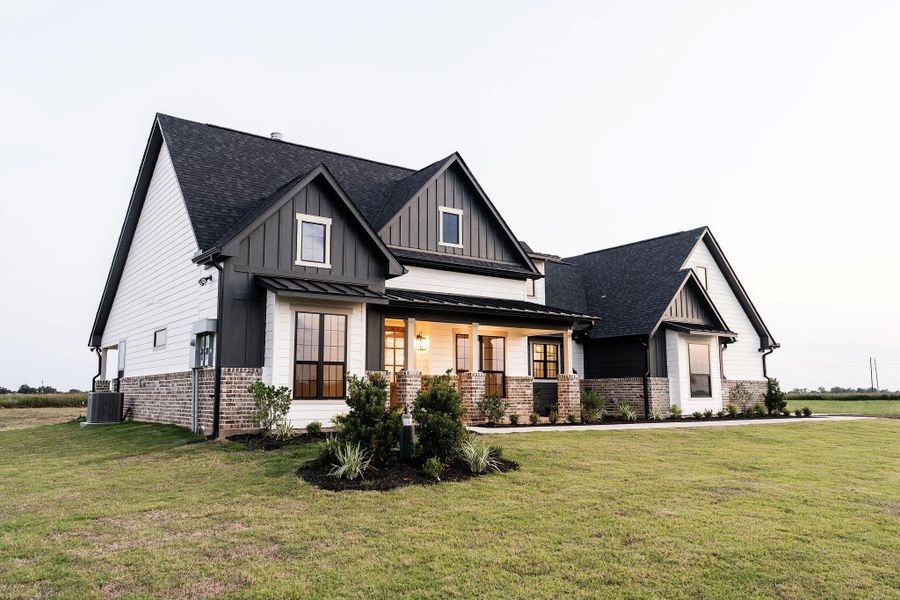 Front exterior of a new home in , East Bernard, TX, highlighting curb appeal (Image 14).