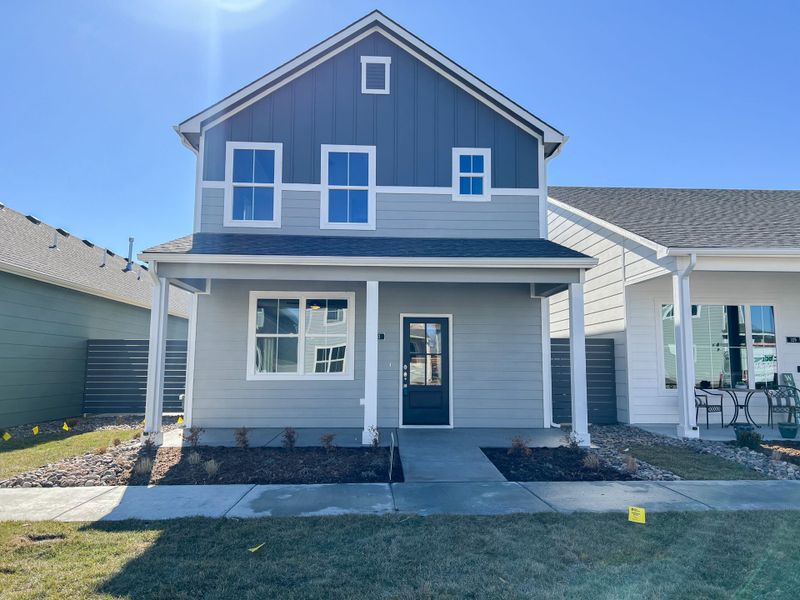 Front exterior of a new home in Heritage Commons, Andover, KS, highlighting curb appeal (Image 1). Front exterior of a new home in Heritage Commons, Andover, KS, highlighting curb appeal (Image 1).