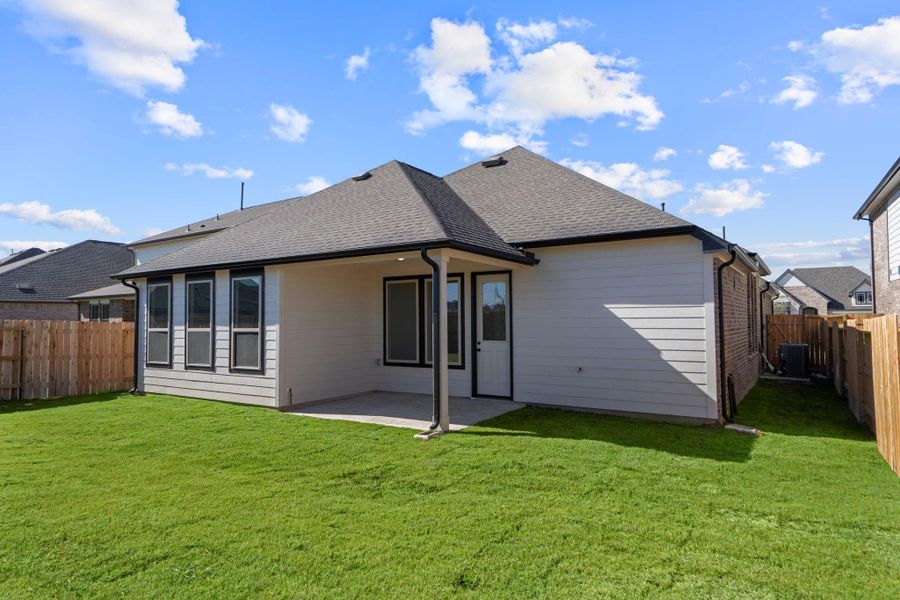 This backyard is perfect for family gatherings, social events, or simply unwinding in the fresh air.