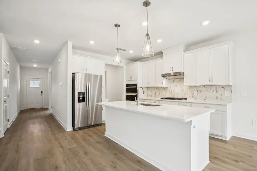Furnished interior view inside a new home in Mission Hills, La Vergne (Image 4).