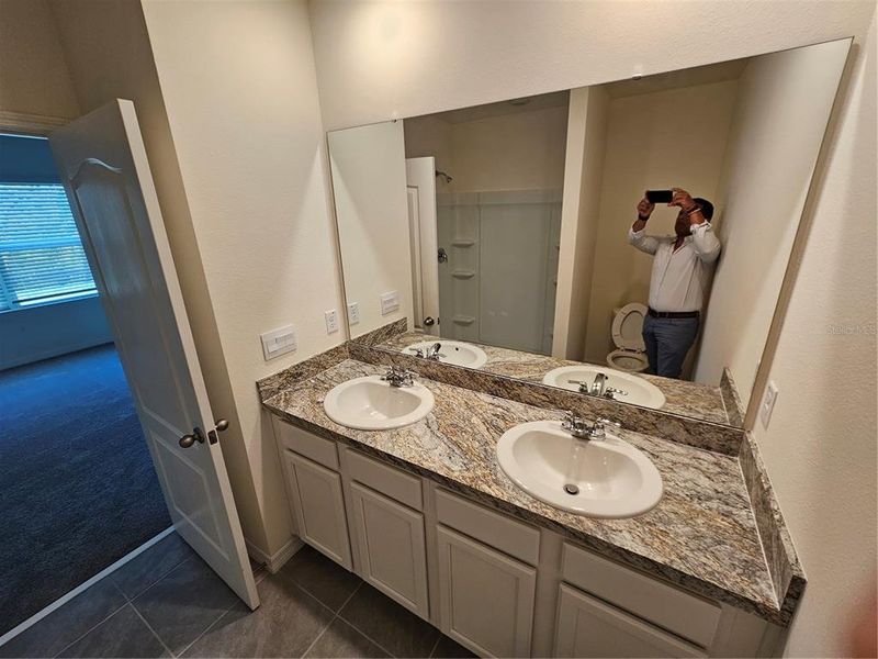 Furnished interior view inside a new home in Charles Cove Express, Davenport (Image 3).