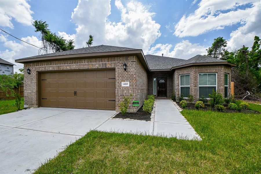 Front exterior of a new home in , Houston, TX, highlighting curb appeal (Image 2).