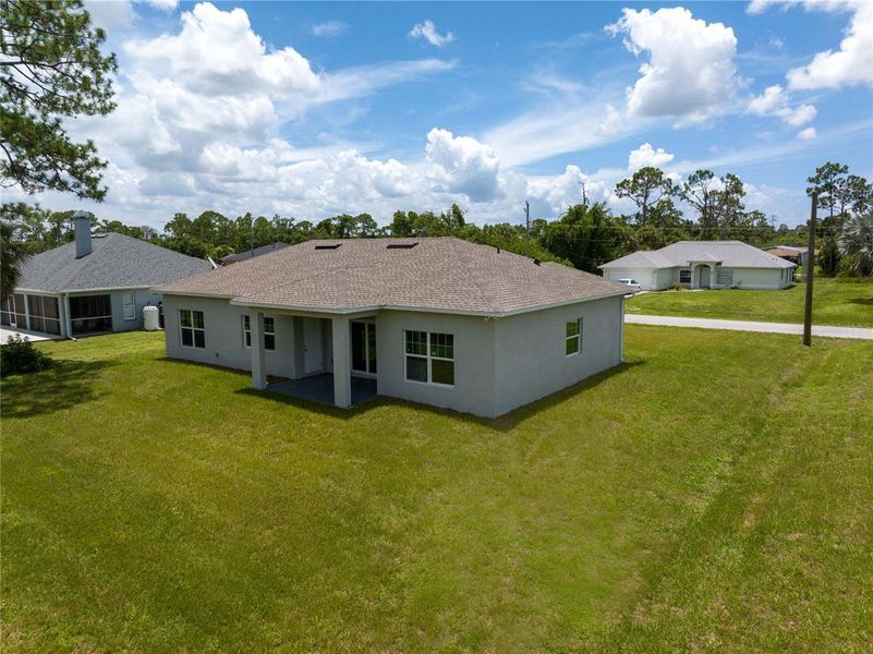 Front exterior of a new home in , North Port, FL, highlighting curb appeal (Image 1). Front exterior of a new home in , North Port, FL, highlighting curb appeal (Image 1).