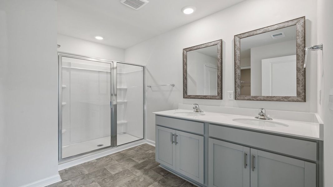 Furnished interior view inside a new home in Bentley Park, Greenwood (Image 11).